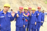 Chinese workers at the Edevu Hydro Project site