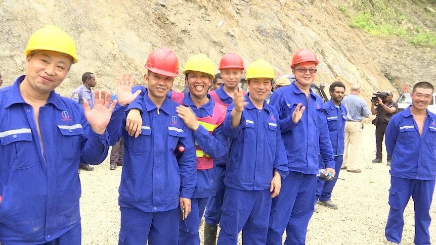 Chinese workers at the Edevu Hydro Project site