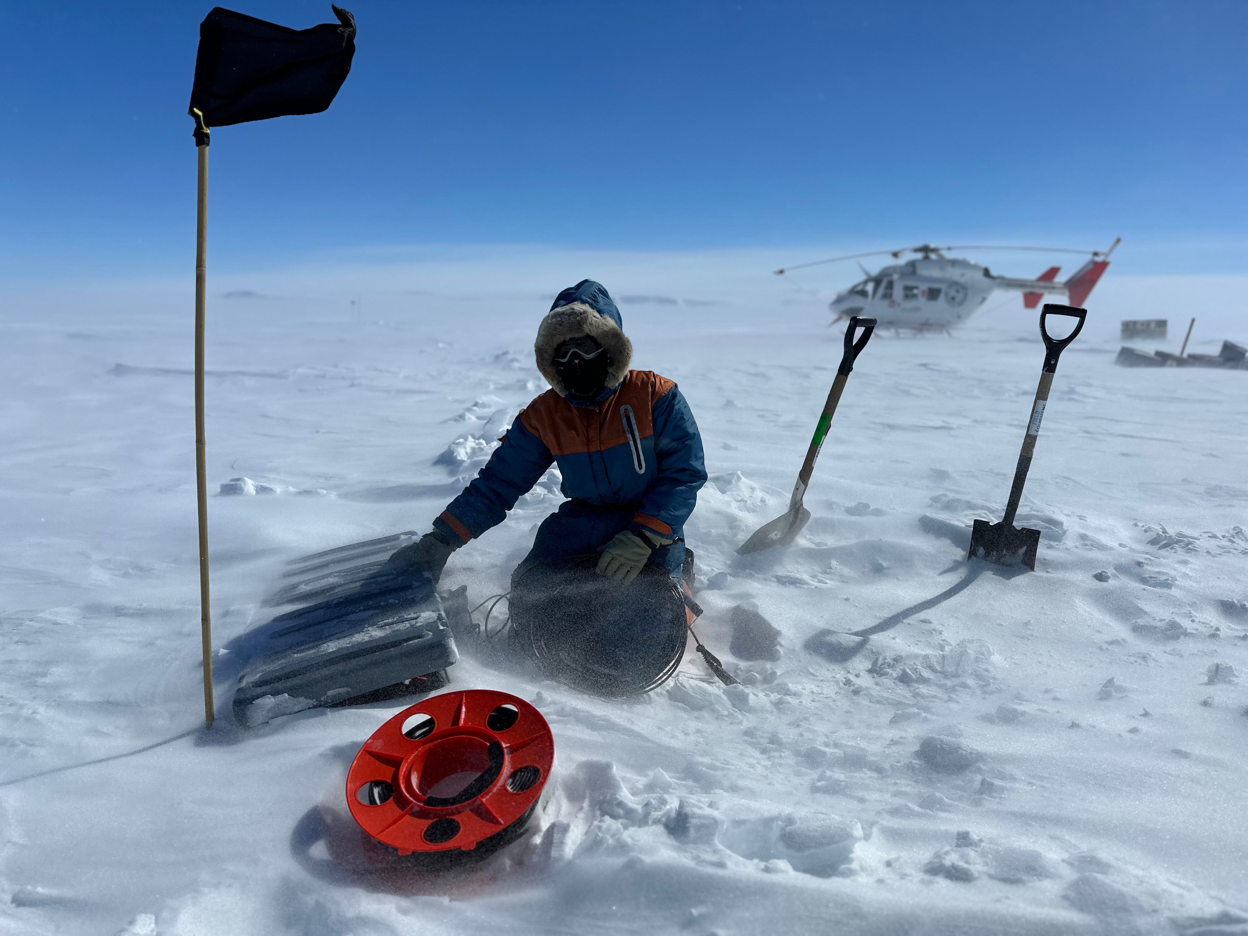 Kate Selway working in glacial wind