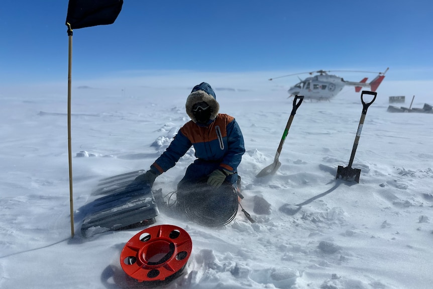Kate Selway working in glacial wind
