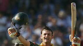 Adam Gilchrist celebrates his ton on way to 121 not out against England at The Oval