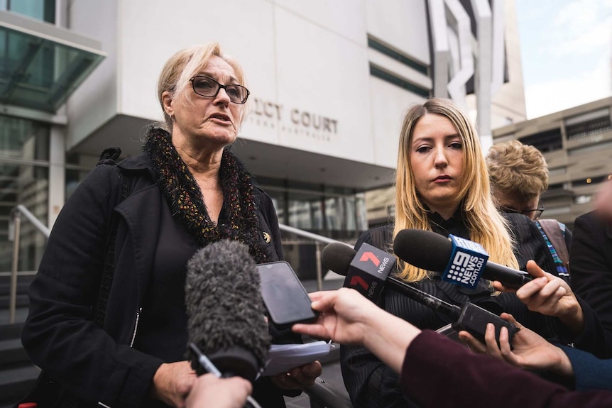 A mid-shot of Patricia Kearney talking to reporters outside the Perth District Court alongside her daughter Siobhan.