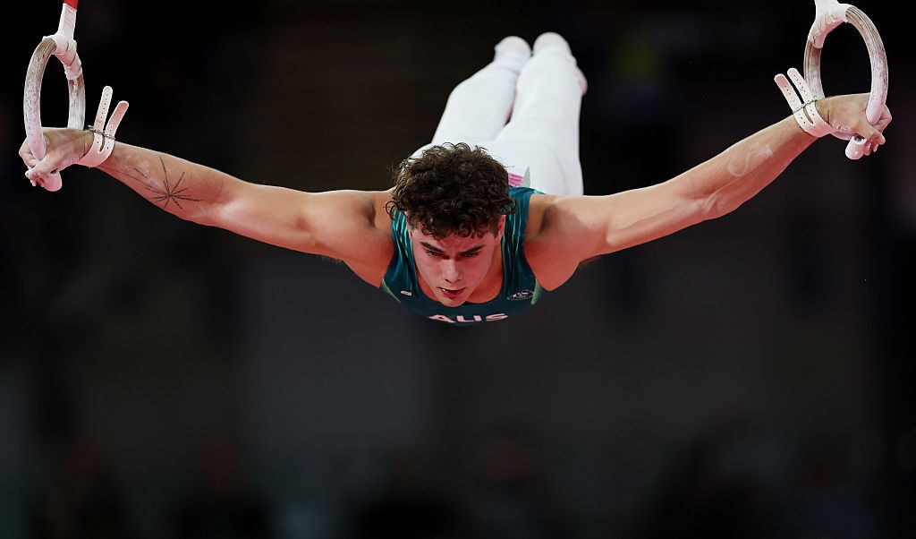 Gymnast James Hardy hangs from the rings at the 2026 Commonwealth Games