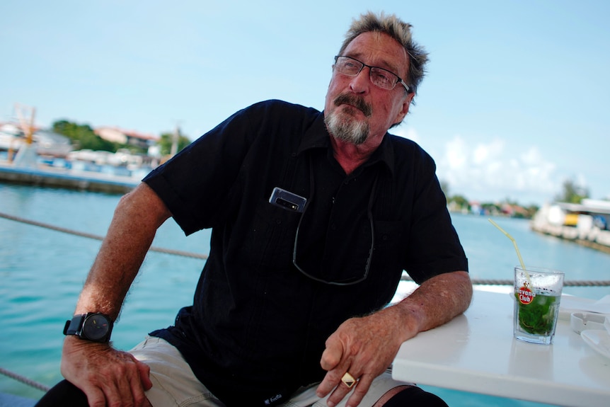 John McAfee on a boat