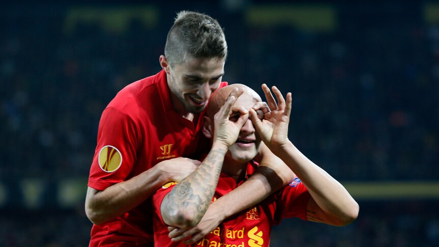 Liverpool's Jonjo Shelvey celebrates scoring his team's fifth goal against Young Boys of Bern.