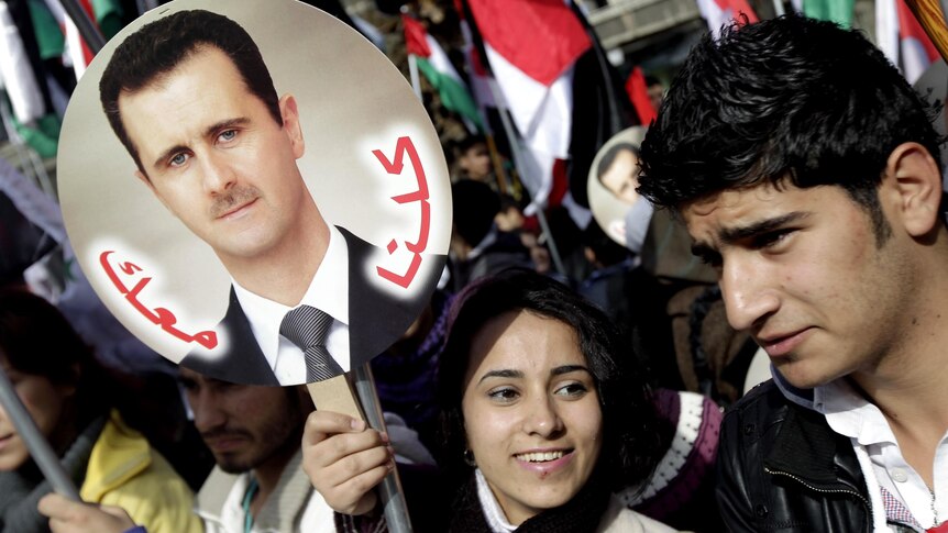 Assad supporters in Damascus