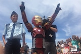 Iron Boy celebrates after saving Sydney from Ultron at the Sydney Opera House.