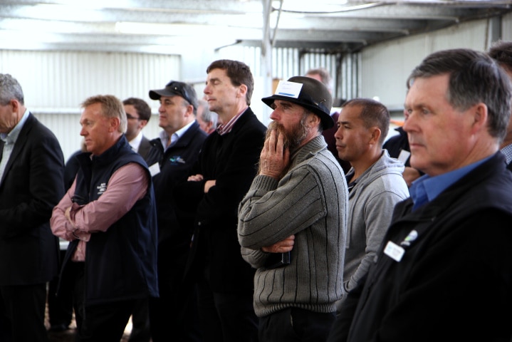 Farmers look on at FTA meeting