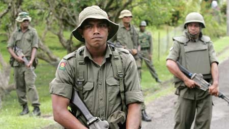 Fijian soldiers man a roadblock