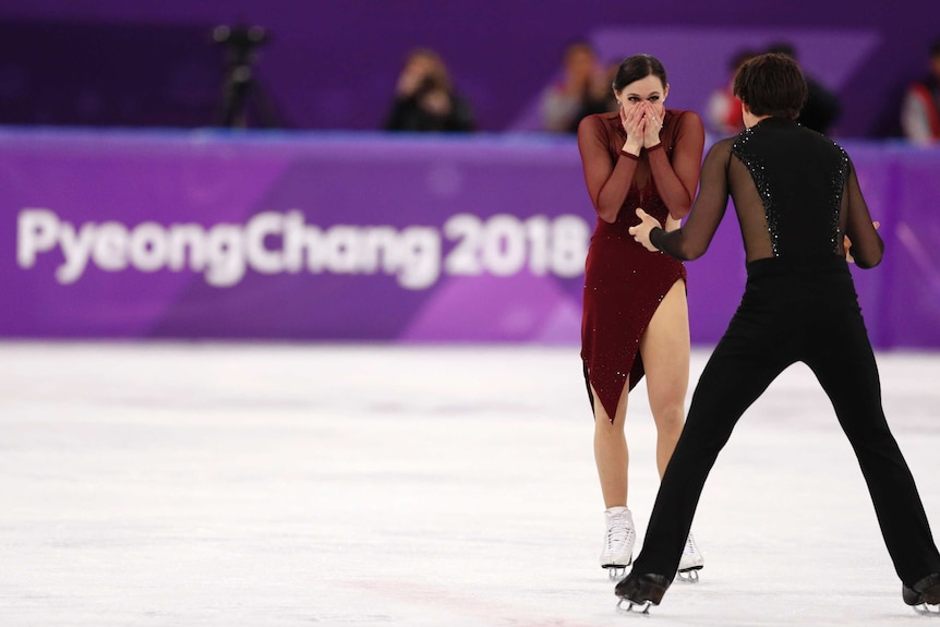 Canada's Tessa Virtue and Scott Moir react after their final ice dancing performance in Pyeongchang.