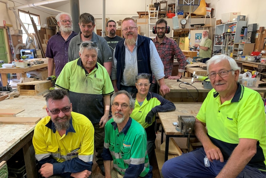 A group of men in a workshop