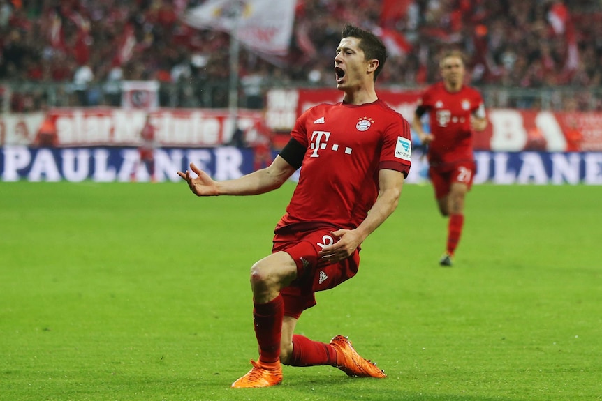 Robert Lewandowski scores one of five goals for Bayern Munich against Wolfsburg