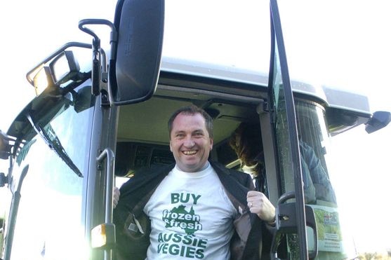 Barnaby Joyce arrives at Parliament House Canberra by tractor