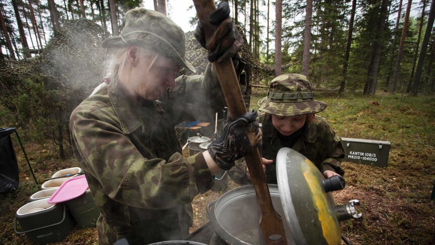 Women's Voluntary Defence Organisation members cooking soup