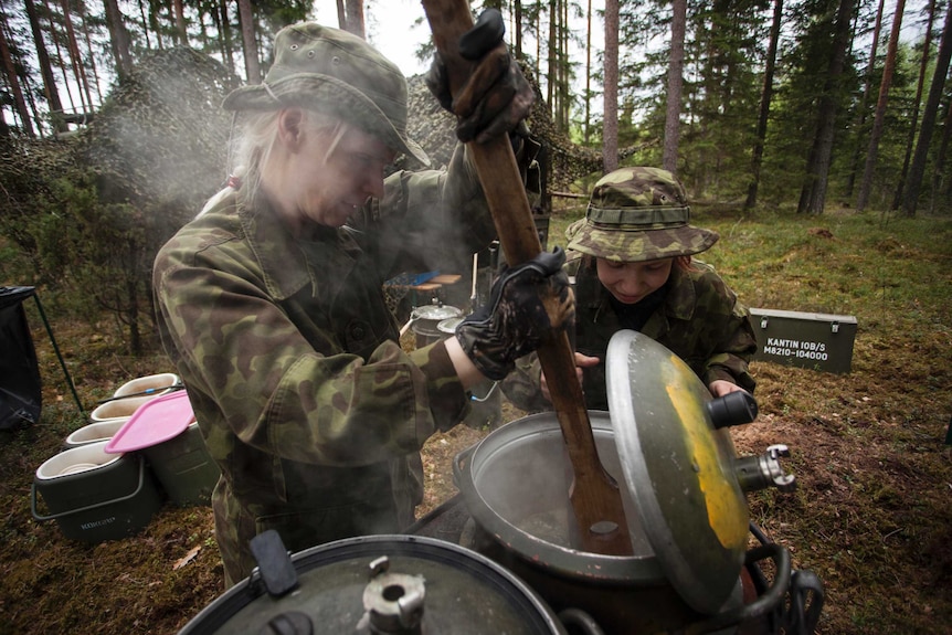 Women's Voluntary Defence Organisation members cooking soup