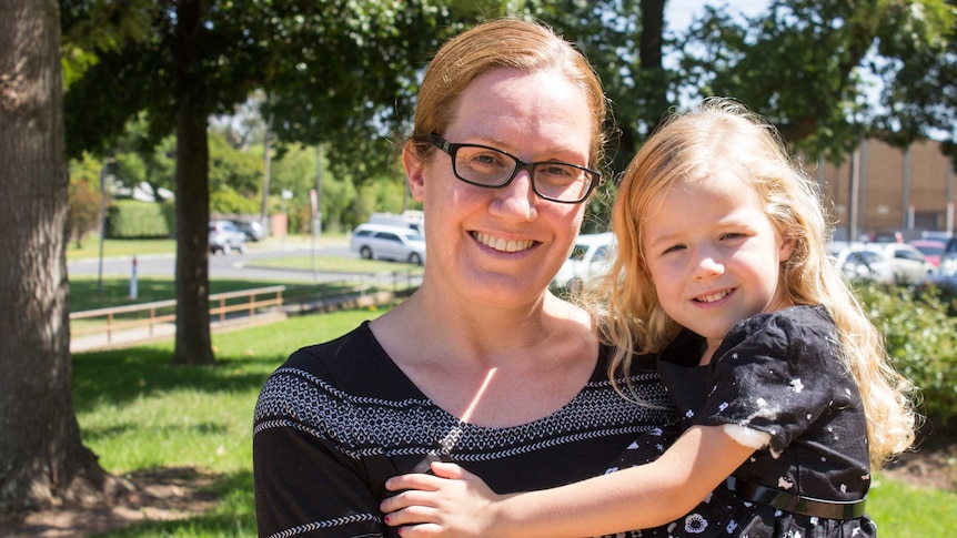 Mother Samantha King with daughter Erin after her four-year immunisation jab.