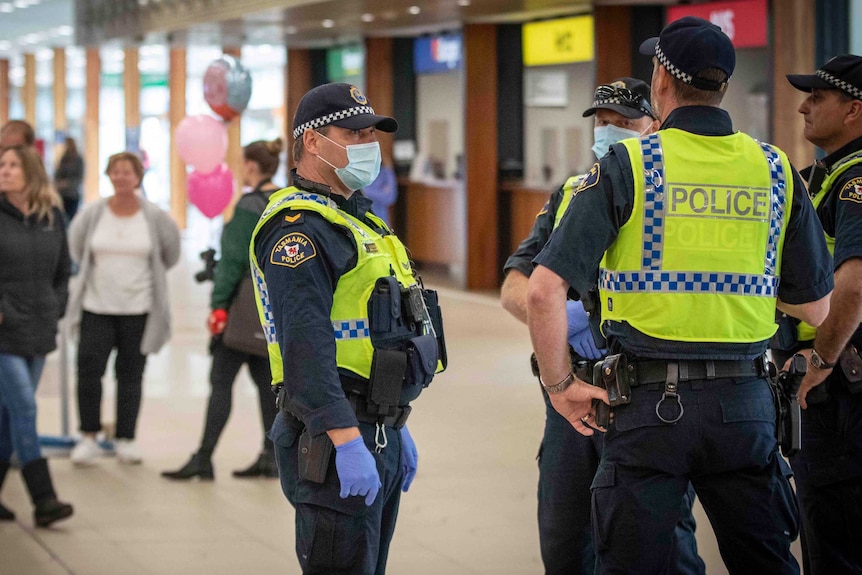 Police standing at an airport