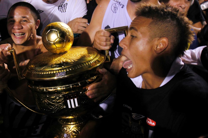 Neymar with the Paulista Championship trophy in 2010