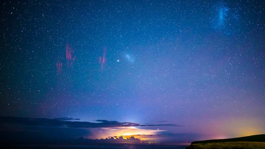 A panorama view from Kiama looking south with visible space lightning.
