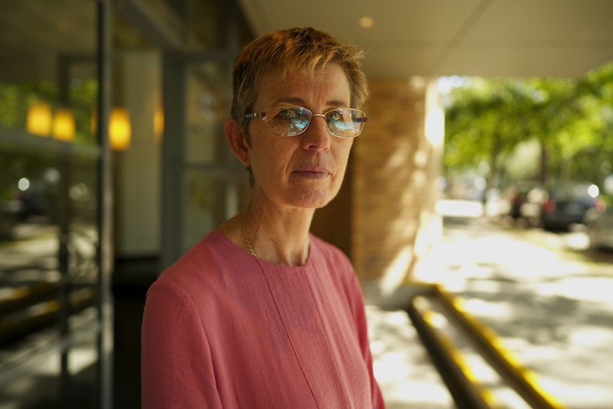 A woman with glasses.