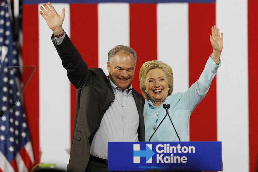 Hillary Clinton and Time Kaine wave to crowds in Miami.