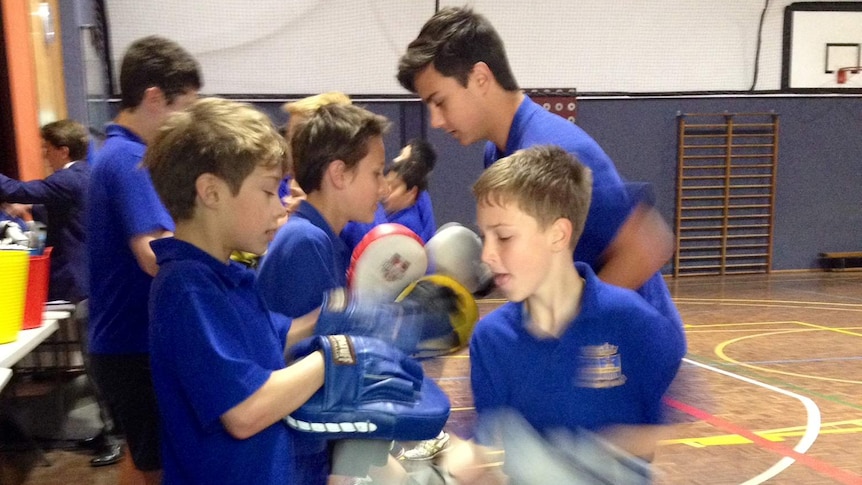 Students from St Pius X College in Sydney's north attend boxercise classes before school.