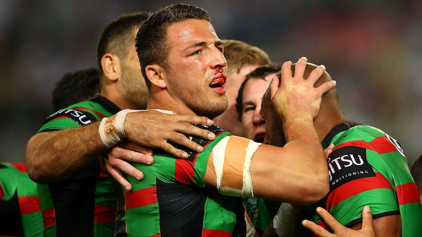 Sam Burgess congratulated team mates during the grand final