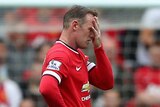 Wayne Rooney reacts to Manchester United loss