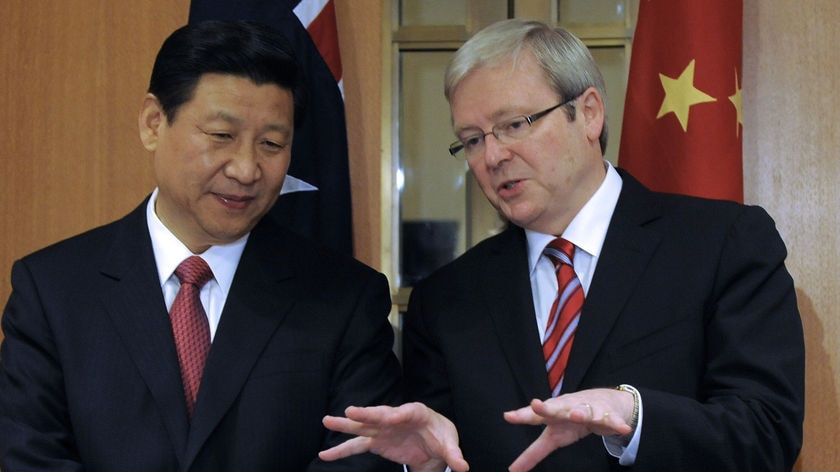 Prime Minister Kevin Rudd (right) speaks to Chinese vice-president Xi Jinping in Canberra on June 21