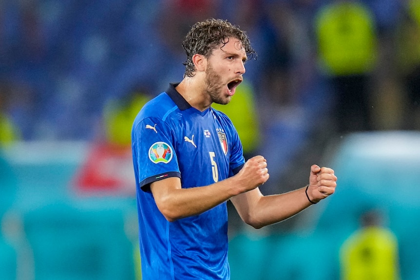 Manuel Locatelli holds both hands in front of him and opens his mouth