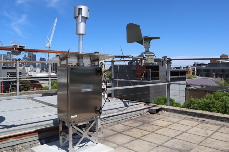 A picture of a shiny box that is the monitoring machine on a roof at Curtin University
