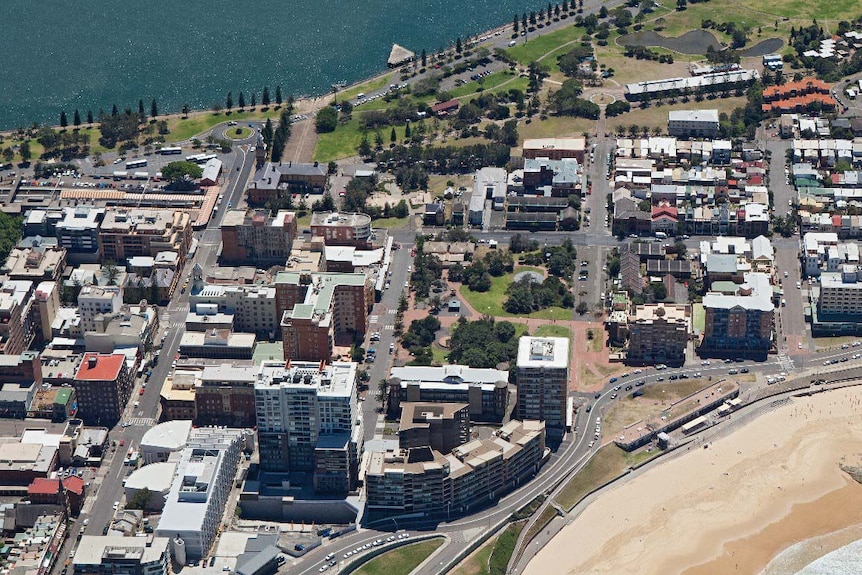 Aerial view over Newcastle beach and CBD