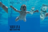 A naked baby swims towards a one dollar bill on the cover of Nirvana's Nevermind