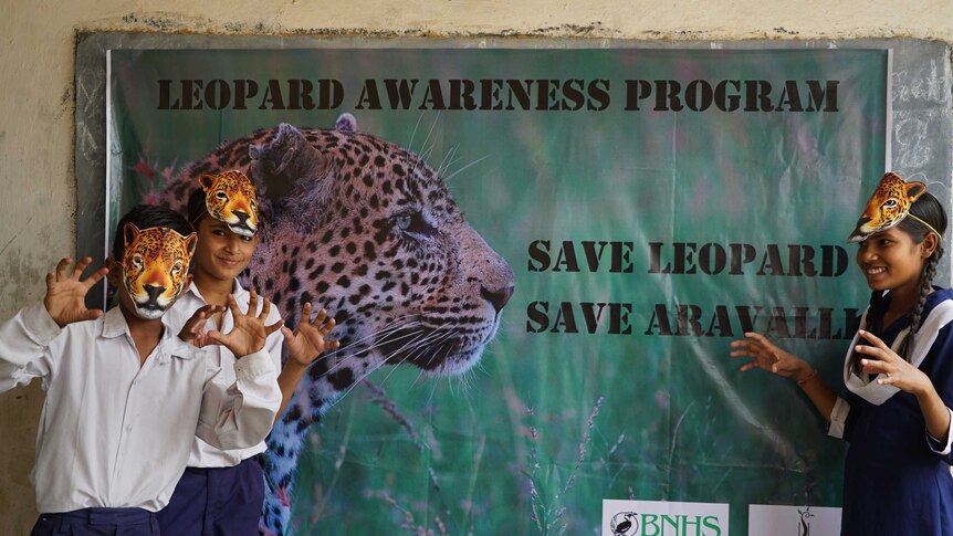 Children being taught conservation and Mangar village.