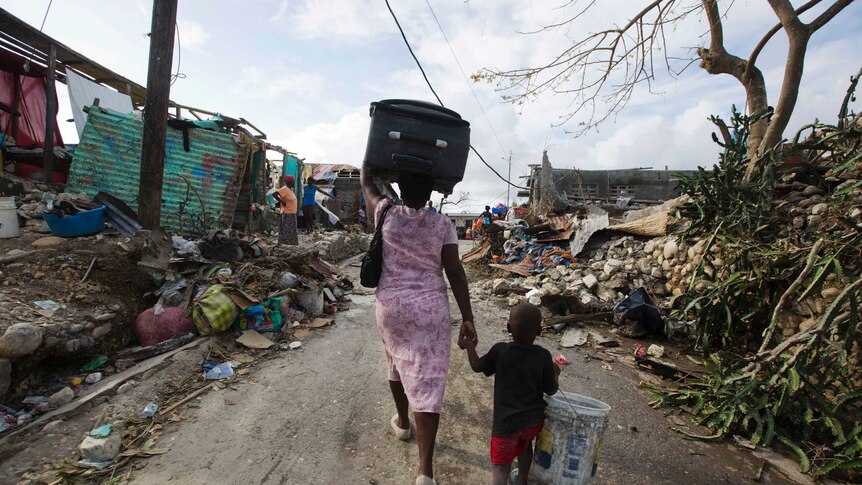 Mother and son leave home: Haiti