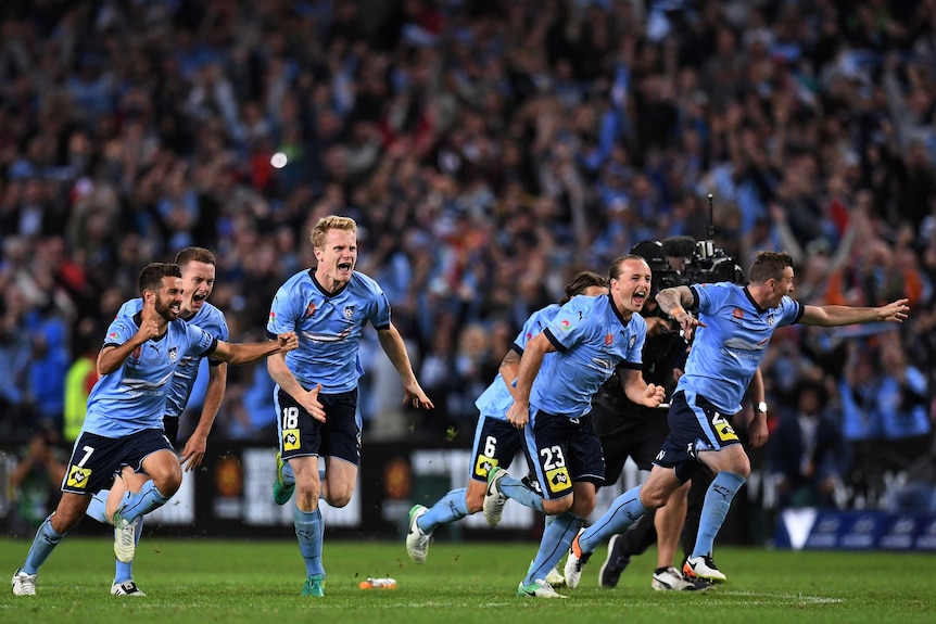 Sydney FC celebrates winning penalty shootout against Victory