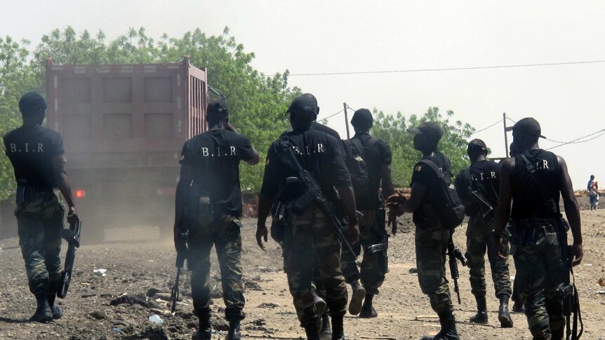 Armed men responding to Boko Haram attacks