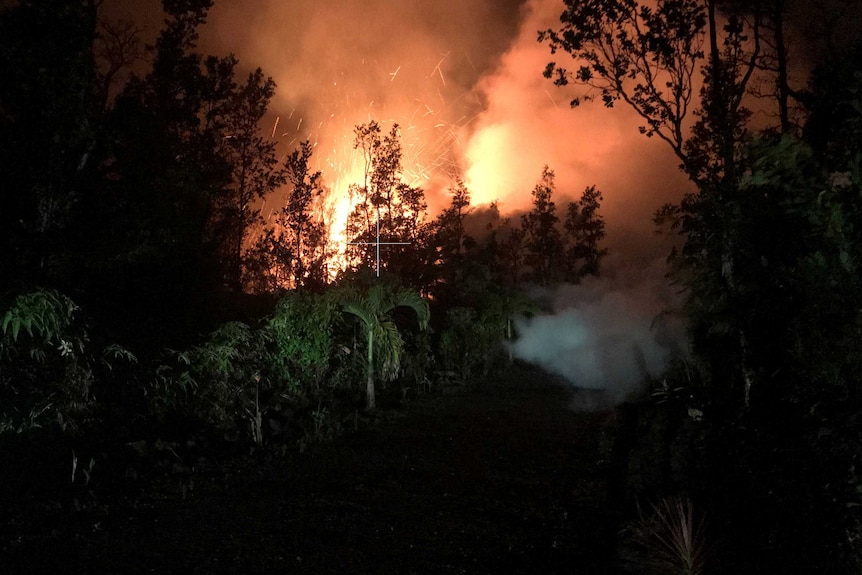 A fissure is seen overnight in the Leilani Estates.