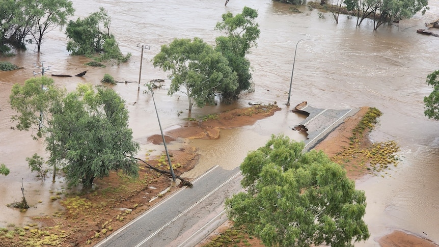 A bridge and parts of highway submerged in floodwaters 