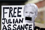 Supporters of Julian Assange stand outside the City of Westminster Magistrates Court