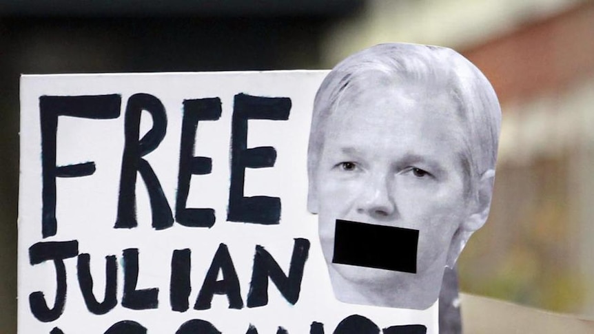 Supporters of Julian Assange stand outside the City of Westminster Magistrates Court