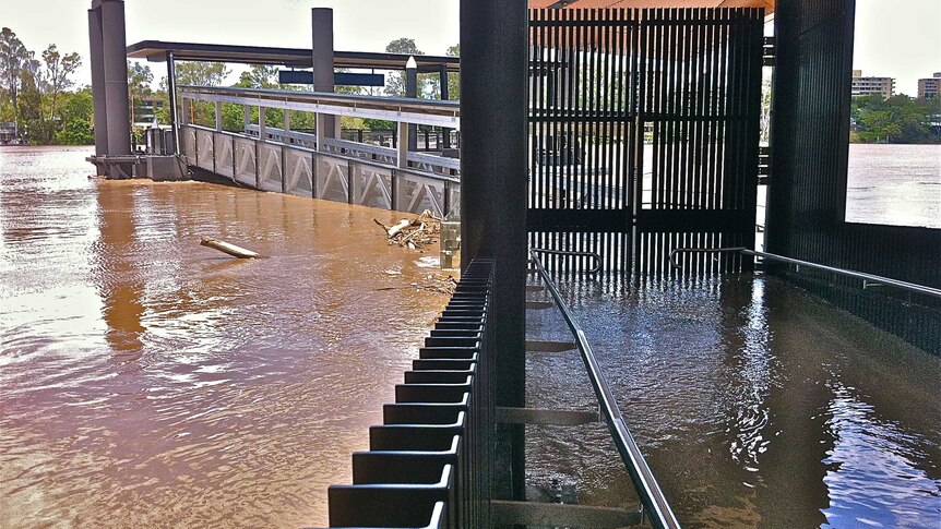 The West End CityCat terminal in Brisbane is submerged by floodwater at high tide, January 29, 2012.