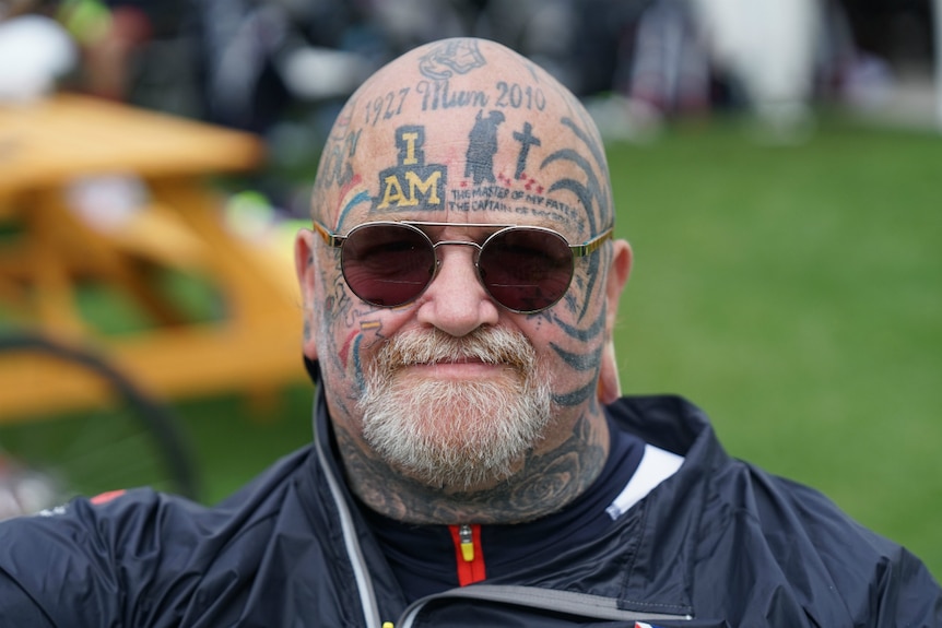 Man with tattoos on his head
