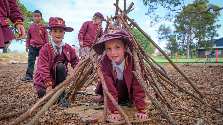 Daceyville students playing in a den.