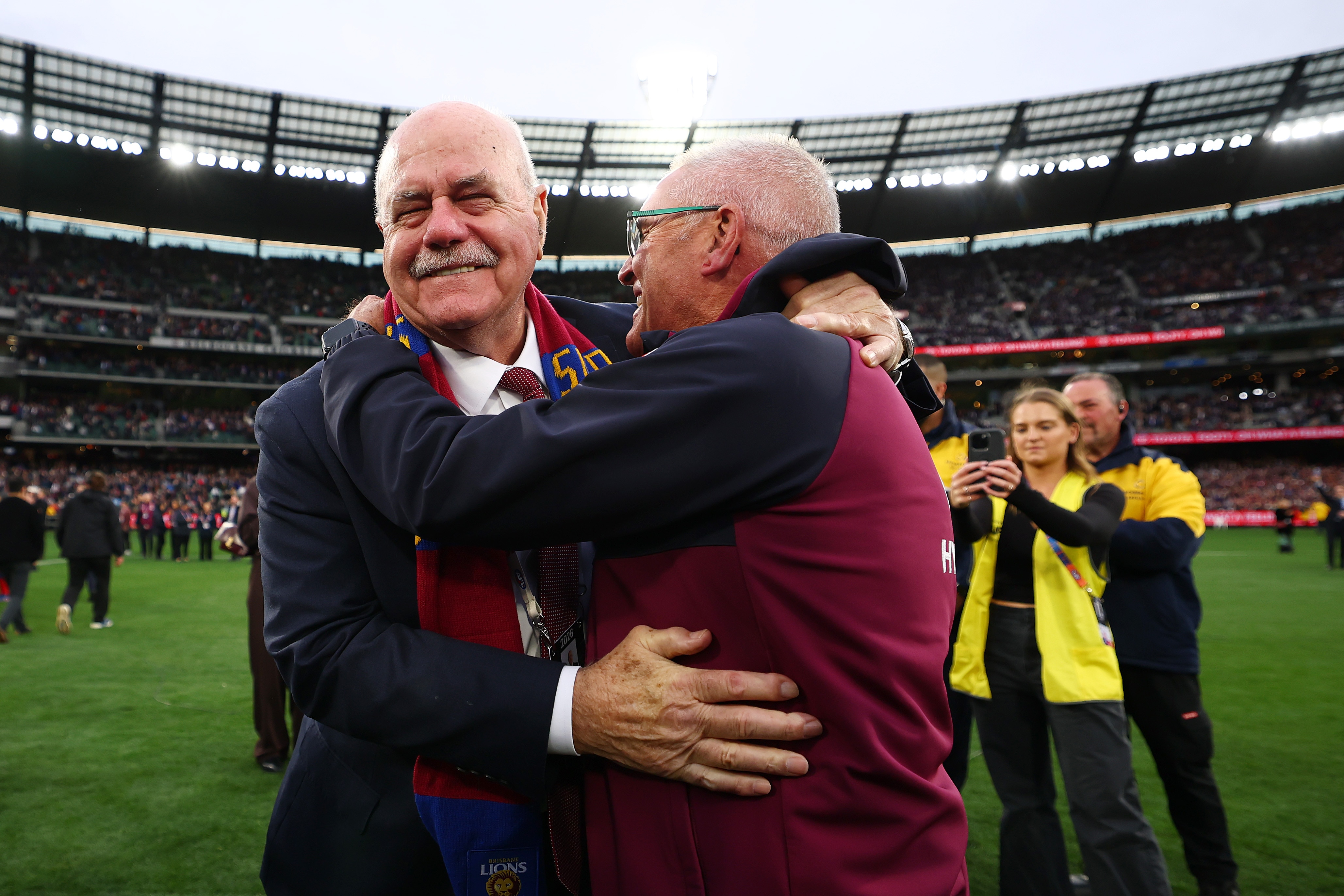 Leigh Matthews and Chris Fagan share a hug together