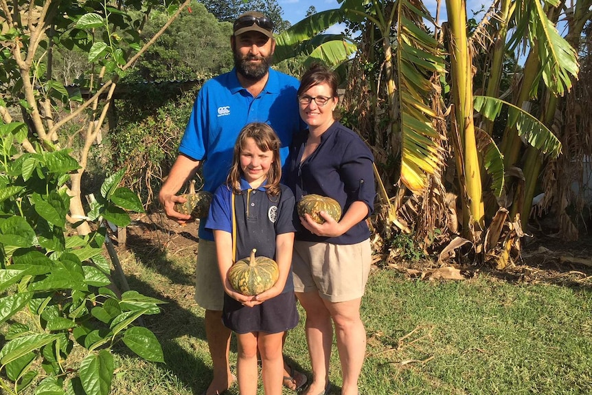 Jonathan and Shontal Seng with pumpkins from their garden.