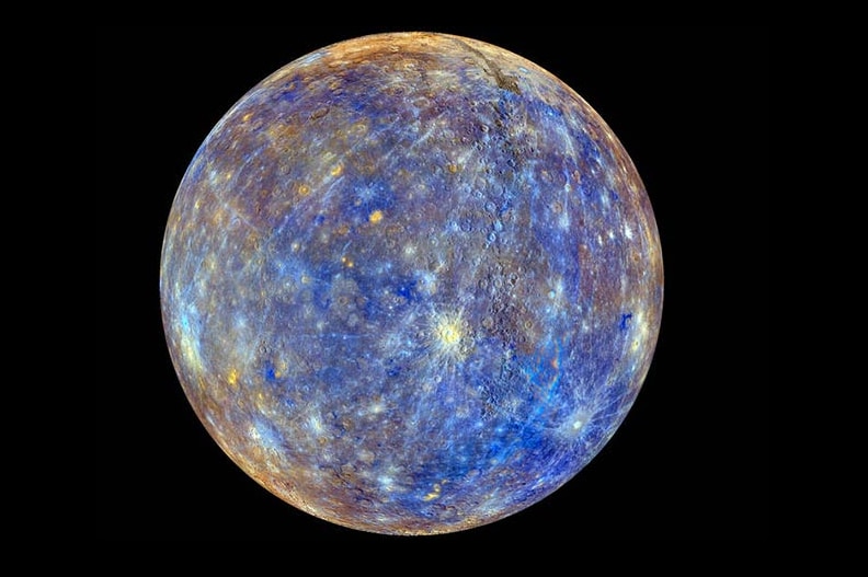 Mercury - a mostly blue planet, with yellow and white specks.