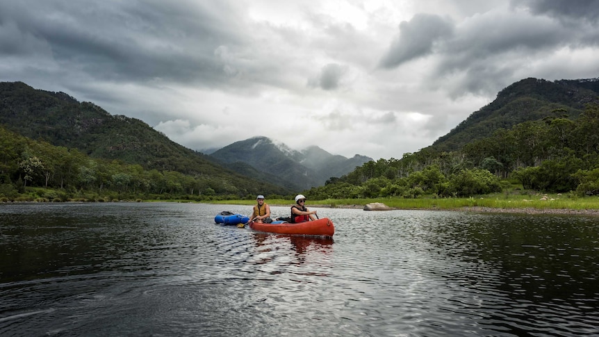 Two kayaks on the Clarence River after a rainstorm.