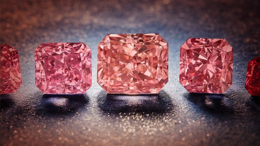A row of pink diamonds.