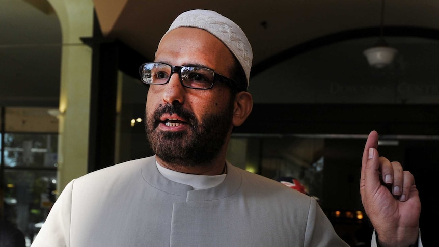 Muslim cleric Man Haron Monis arrives at Downing Centre in 2011